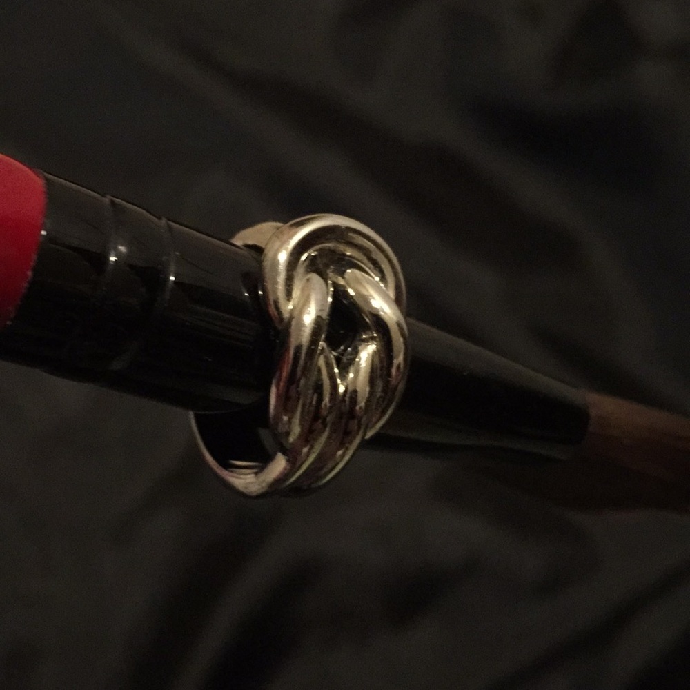 Ring, silver tone knot